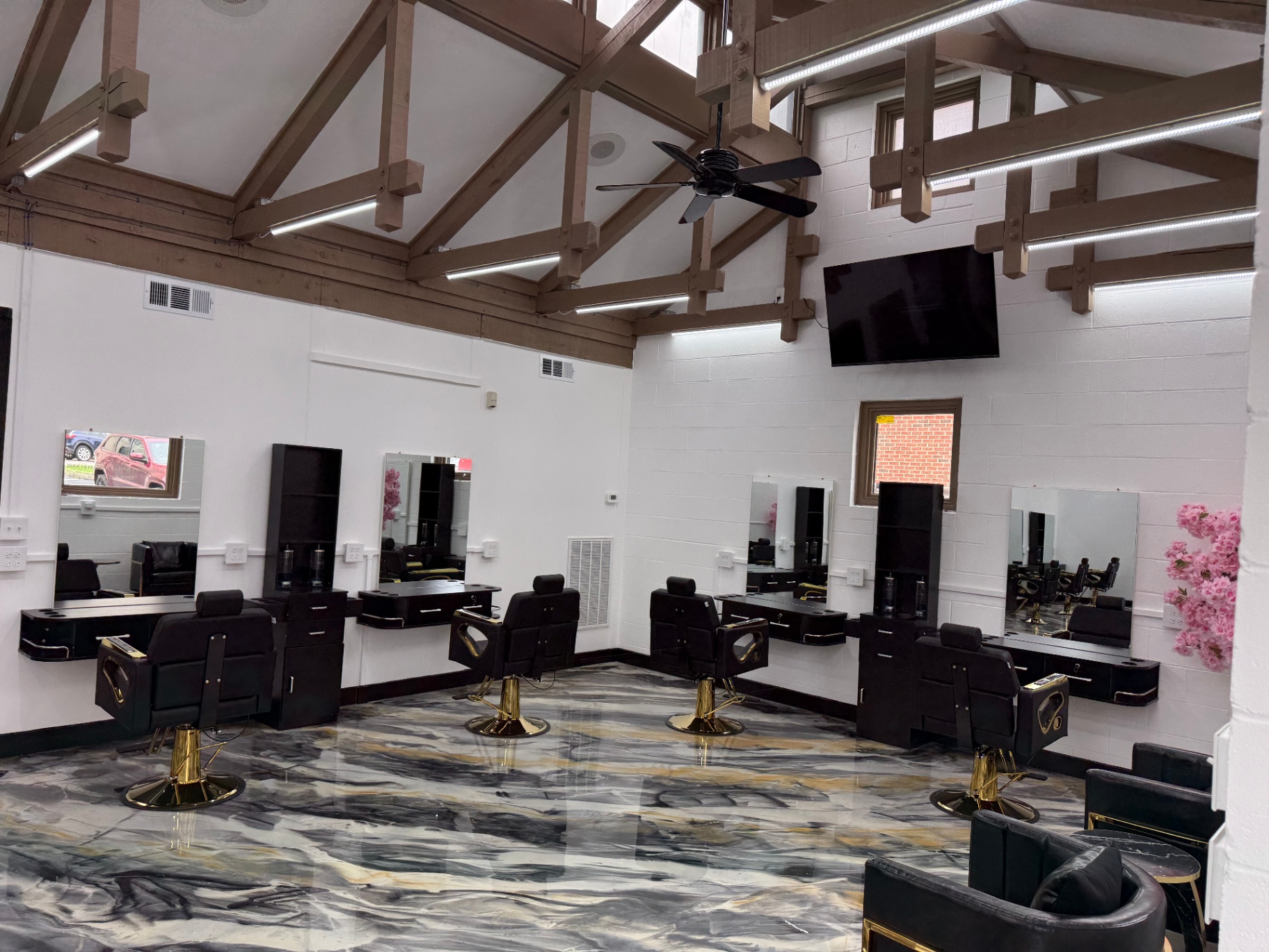 Row of stations for threading, waxing, and lash services